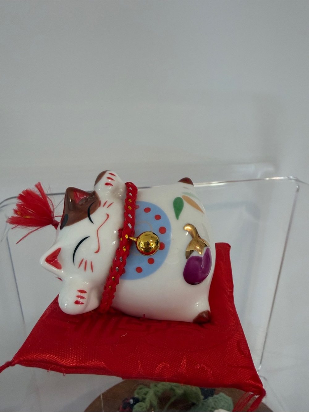 Ceramic Lucky Cat Figurine with Red Cushion